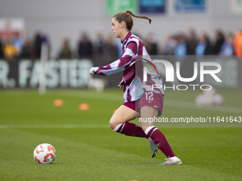 Emma Harries #12 of West Ham United F.C. warms up during the Barclays FA Women's Super League match between Manchester City and West Ham Uni...