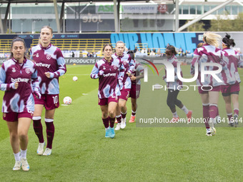 West Ham United F.C. players warm up during the Barclays FA Women's Super League match between Manchester City and West Ham United at the Jo...