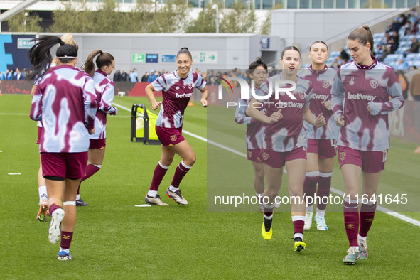 West Ham United F.C. players warm up during the Barclays FA Women's Super League match between Manchester City and West Ham United at the Jo...