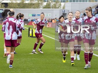 West Ham United F.C. players warm up during the Barclays FA Women's Super League match between Manchester City and West Ham United at the Jo...