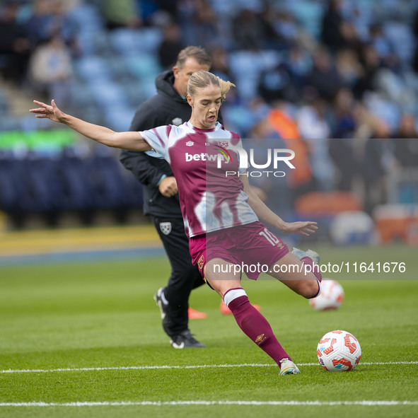 Dagny Brynjarsdottir #10 of West Ham United F.C. warms up during the Barclays FA Women's Super League match between Manchester City and West...