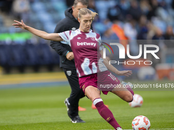 Dagny Brynjarsdottir #10 of West Ham United F.C. warms up during the Barclays FA Women's Super League match between Manchester City and West...