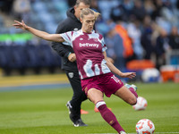 Dagny Brynjarsdottir #10 of West Ham United F.C. warms up during the Barclays FA Women's Super League match between Manchester City and West...