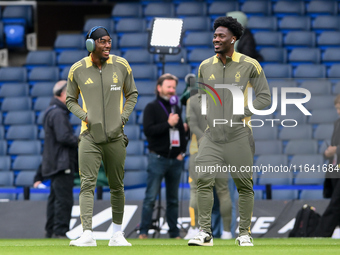 Anthony Elanga and Ola Aina of Nottingham Forest inspect the pitch ahead of the Premier League match between Chelsea and Nottingham Forest a...