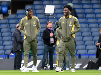 Anthony Elanga and Ola Aina of Nottingham Forest inspect the pitch ahead of the Premier League match between Chelsea and Nottingham Forest a...