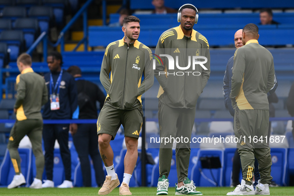 Morato of Nottingham Forest and Carlos Miguel, Nottingham Forest goalkeeper, participate in the Premier League match between Chelsea and Not...