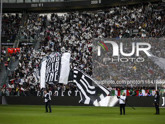 Juventus supporters cheer during the Serie A football match number 7, Juventus vs. Cagliari, at the Allianz Stadium in Turin, Piedmont, Ital...