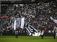 Juventus supporters cheer during the Serie A football match number 7, Juventus vs. Cagliari, at the Allianz Stadium in Turin, Piedmont, Ital...