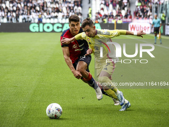 Juventus forward Francisco Conceicao (7) fights for the ball against Cagliari defender Adam Obert (33) during the Serie A football match num...