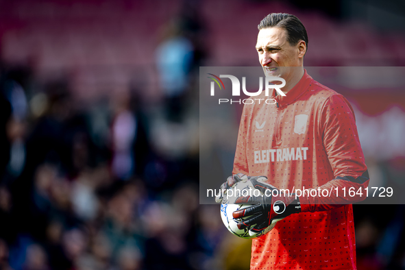 FC Twente goalkeeper Przemyslaw Tyton plays during the match between Feyenoord and Twente at the Feyenoord stadium De Kuip for the Dutch Ere...