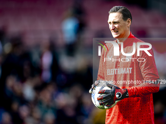 FC Twente goalkeeper Przemyslaw Tyton plays during the match between Feyenoord and Twente at the Feyenoord stadium De Kuip for the Dutch Ere...