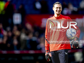 FC Twente goalkeeper Przemyslaw Tyton plays during the match between Feyenoord and Twente at the Feyenoord stadium De Kuip for the Dutch Ere...