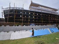 Workers make a Titanic ship as a pandal for the Durga Puja festival in Nagaon District, Assam, India, on October 6, 2024. (