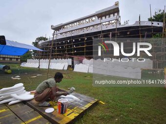 Workers make a Titanic ship as a pandal for the Durga Puja festival in Nagaon District, Assam, India, on October 6, 2024. (