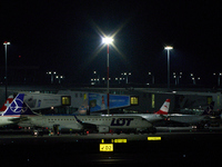 LOT Polish Airlines passenger jets are seen on the tarmac at Chopin Airport from the Warsaw Institute of Aviation in Warsaw, Poland on 04 Oc...