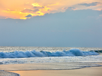 The sun sets along Paruthiyoor Beach in Paruthiyoor, Kerala, India, on April 15, 2024. (