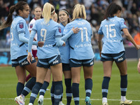 Lauren Hemp #11 of Manchester City W.F.C. celebrates her goal during the Barclays FA Women's Super League match between Manchester City and...