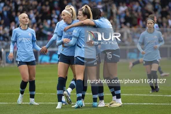 Lauren Hemp #11 of Manchester City W.F.C. celebrates her goal during the Barclays FA Women's Super League match between Manchester City and...