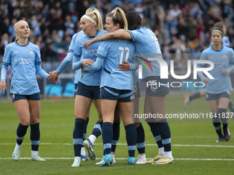 Lauren Hemp #11 of Manchester City W.F.C. celebrates her goal during the Barclays FA Women's Super League match between Manchester City and...