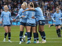 Lauren Hemp #11 of Manchester City W.F.C. celebrates her goal during the Barclays FA Women's Super League match between Manchester City and...