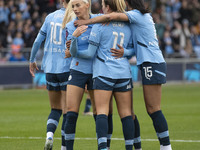 Lauren Hemp #11 of Manchester City W.F.C. celebrates her goal during the Barclays FA Women's Super League match between Manchester City and...