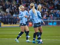 Lauren Hemp #11 of Manchester City W.F.C. celebrates her goal during the Barclays FA Women's Super League match between Manchester City and...