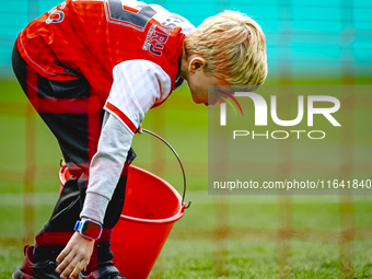 A young grass boy is present during the match between Feyenoord and Twente at the Feyenoord stadium De Kuip for the Dutch Eredivisie season...