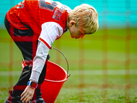 A young grass boy is present during the match between Feyenoord and Twente at the Feyenoord stadium De Kuip for the Dutch Eredivisie season...