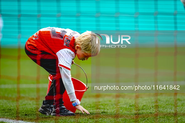 A young grass boy is present during the match between Feyenoord and Twente at the Feyenoord stadium De Kuip for the Dutch Eredivisie season...