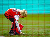 A young grass boy is present during the match between Feyenoord and Twente at the Feyenoord stadium De Kuip for the Dutch Eredivisie season...