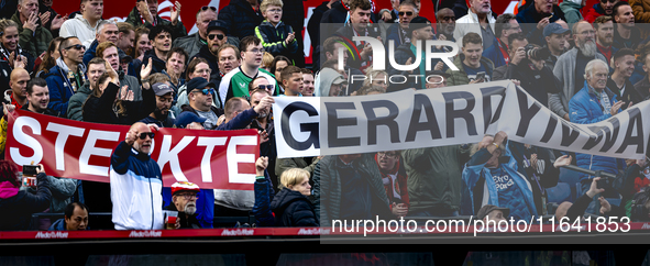 Supporters of Feyenoord Rotterdam attend the match between Feyenoord and Twente at the Feyenoord stadium De Kuip for the Dutch Eredivisie se...