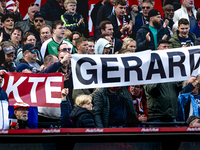 Supporters of Feyenoord Rotterdam attend the match between Feyenoord and Twente at the Feyenoord stadium De Kuip for the Dutch Eredivisie se...