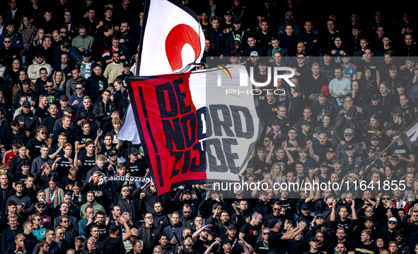 Supporters of Feyenoord Rotterdam attend the match between Feyenoord and Twente at the Feyenoord stadium De Kuip for the Dutch Eredivisie se...