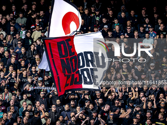 Supporters of Feyenoord Rotterdam attend the match between Feyenoord and Twente at the Feyenoord stadium De Kuip for the Dutch Eredivisie se...