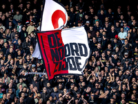 Supporters of Feyenoord Rotterdam attend the match between Feyenoord and Twente at the Feyenoord stadium De Kuip for the Dutch Eredivisie se...