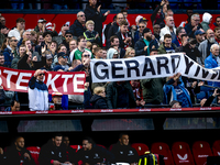 Supporters of Feyenoord Rotterdam attend the match between Feyenoord and Twente at the Feyenoord stadium De Kuip for the Dutch Eredivisie se...