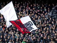 Supporters of Feyenoord Rotterdam attend the match between Feyenoord and Twente at the Feyenoord stadium De Kuip for the Dutch Eredivisie se...