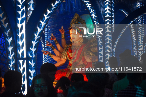 People visit a pandal or temporary platform on the occasion of the Durga Puja festival in Kolkata, India, on October 6, 2024. 