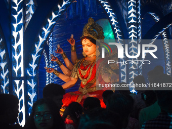 People visit a pandal or temporary platform on the occasion of the Durga Puja festival in Kolkata, India, on October 6, 2024. (