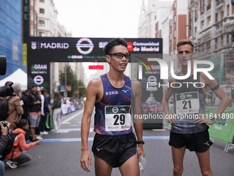 Toshikazu Yamanishi (left) and Francesco Fortunato (right) participate in the international 10km race walk in Madrid, Spain, on October 6. (