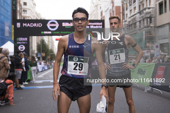 Toshikazu Yamanishi (left) and Francesco Fortunato (right) participate in the international 10km race walk in Madrid, Spain, on October 6. 