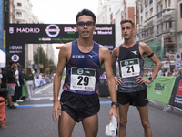 Toshikazu Yamanishi (left) and Francesco Fortunato (right) participate in the international 10km race walk in Madrid, Spain, on October 6. (