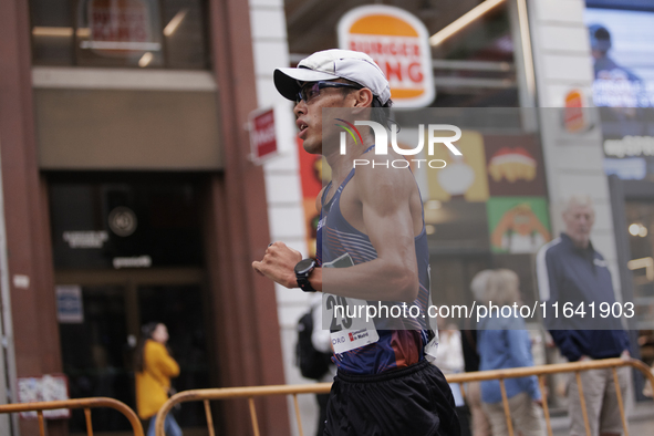 Toshikazu Yamanishi participates in the international 10km race walk in Madrid, Spain, on October 6. 