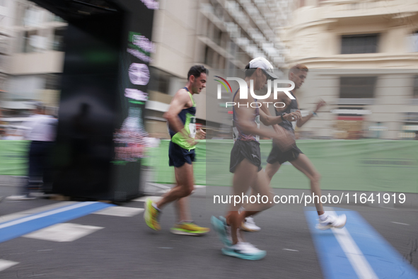 In Madrid, Spain, on October 6, Diego Garcia, Toshikazu Yamanishi, and Francesco Fortunato participate in the international 10km race walk. 