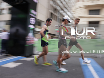 In Madrid, Spain, on October 6, Diego Garcia, Toshikazu Yamanishi, and Francesco Fortunato participate in the international 10km race walk....