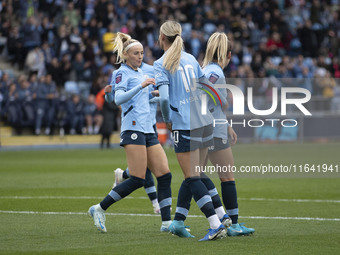 Lauren Hemp #11 of Manchester City W.F.C. celebrates her goal during the Barclays FA Women's Super League match between Manchester City and...