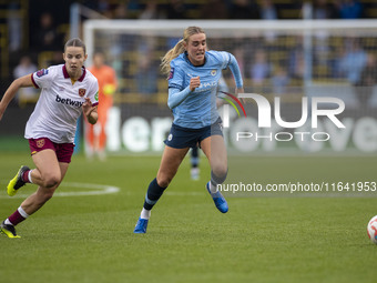 Jill Roord #10 of Manchester City W.F.C. is challenged by the opponent during the Barclays FA Women's Super League match between Manchester...