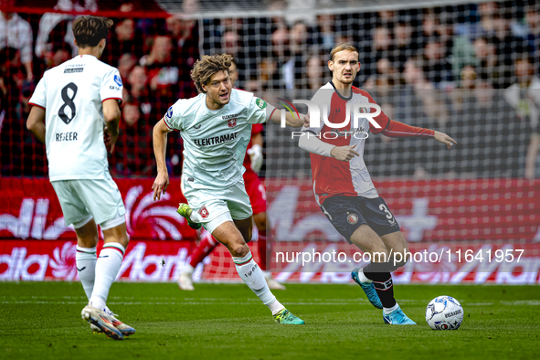 FC Twente forward Sam Lammers and Feyenoord Rotterdam defender Thomas Beelen play during the match between Feyenoord and Twente at the Feyen...