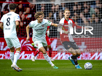 FC Twente forward Sam Lammers and Feyenoord Rotterdam defender Thomas Beelen play during the match between Feyenoord and Twente at the Feyen...