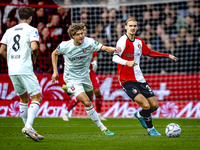 FC Twente forward Sam Lammers and Feyenoord Rotterdam defender Thomas Beelen play during the match between Feyenoord and Twente at the Feyen...